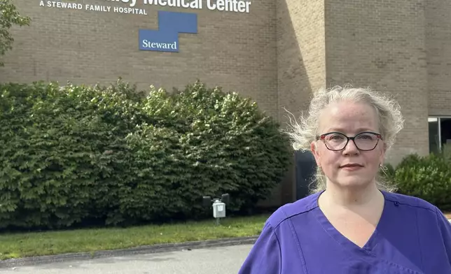 Christina Hernon, an emergency physician, stands outside the Nashoba Valley Medical Center in Ayer, Mass., on Friday, Aug. 9, 2024. (AP Photo/Nick Perry)