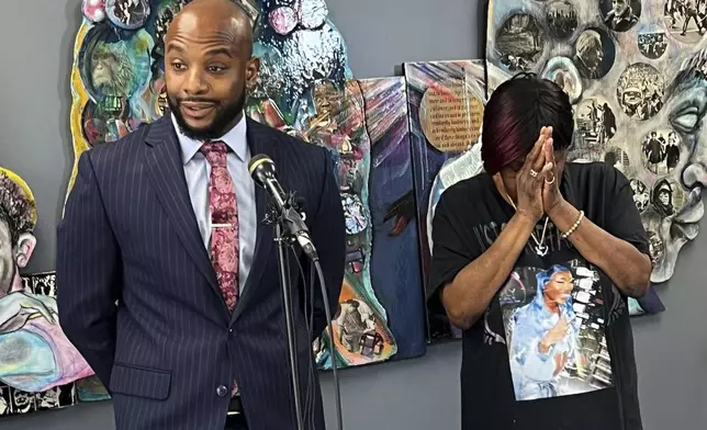 Attorney Sean Walton and Ta’Kiya Young's grandmother Nadine Young react after an Ohio police officer was indicted on charges including murder in the shooting of Ta’Kiya Young on Tuesday, Aug. 13, 2024 in Columbus, Ohio. (AP Photo/Patrick Aftoora Orsagos)