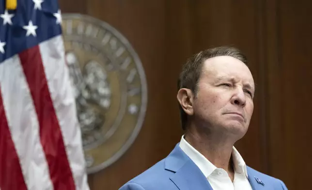 Louisiana Gov. Jeff Landry ponders his response to a reporter's question during a press conference regarding the Ten Commandments in schools Monday, Aug. 5, 2024, in Baton Rouge, La. Louisiana Attorney General Liz Murrill announced on Monday that she is filing a brief in federal court asking a judge to dismiss a lawsuit seeking to overturn the state’s new law requiring that the Ten Commandments be displayed in every public school classroom. (Hilary Scheinuk/The Advocate via AP)