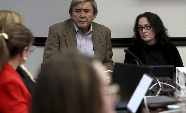 Antonios Pagourtzis, left, and Rose Marie Kosmetatos, parents of accused school shooter Dimitrios Pagourtzis, await the start of the civil trial against them in Galveston County Court No. 3 Judge Jack Ewing's courtroom at the Galveston County Courthouse in Galveston, Texas on Wednesday, July 31, 2024. (Jennifer Reynolds/The Galveston County Daily News via AP, Pool)