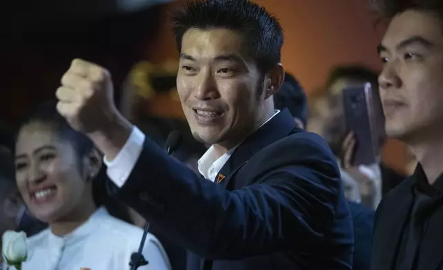 FILE - Thailand's Future Forward Party leader Thanathorn Juangroongruangkit, center, talks to media during a press conference at the party's headquarters in Bangkok, Thailand, on Jan. 21, 2020. (AP Photo/Sakchai Lalit, File)