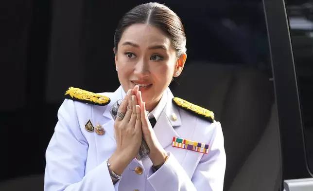 Thailand newly elected Prime Minister Paetongtarn Shinawatra arrives before the royal endorsement ceremony appointing Paetongtarn as Thailand's new prime minister at Pheu Thai party headquarters in Bangkok, Thailand, Sunday, Aug. 18, 2024. (AP Photo/Sakchai Lalit)