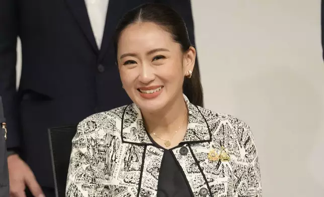 Leader of Pheu Thai Party, Paetongtarn Shinawatra, daughter of Thailand's former Prime Minister Thaksin Shinawatra, smiles during press conference in Bangkok, Thailand, Thursday, Aug. 15, 2024. (AP Photo/Sakchai Lalit)