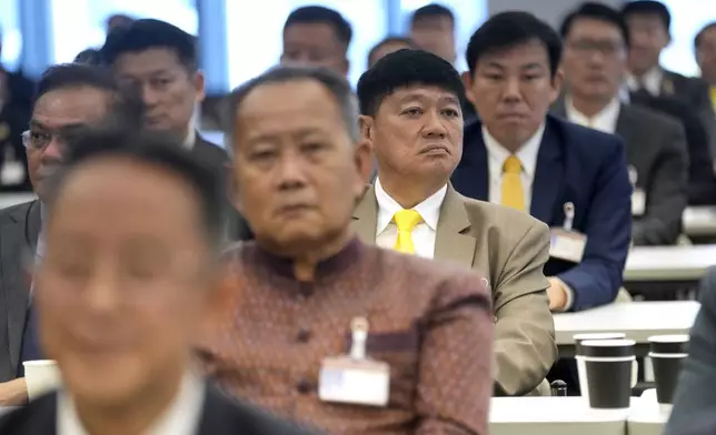 Members of Pheu Thai party hold a meeting at Parliament in Bangkok, Thailand, Thursday, Aug. 15, 2024. (AP Photo/Sakchai Lalit)