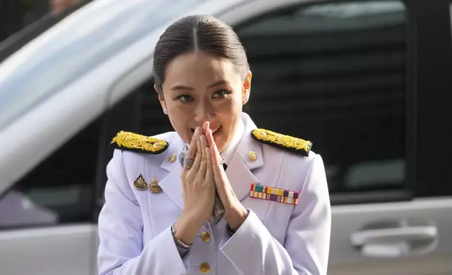 Thailand newly elected Prime Minister Paetongtarn Shinawatra arrives before the royal endorsement ceremony appointing Paetongtarn as Thailand's new prime minister at Pheu Thai party headquarters in Bangkok, Thailand, Sunday, Aug. 18, 2024. (AP Photo/Sakchai Lalit)