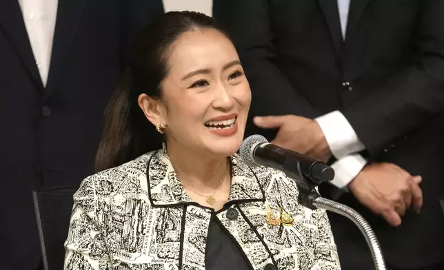 Leader of Pheu Thai Party, Paetongtarn Shinawatra, daughter of Thailand's former Prime Minister Thaksin Shinawatra, talks to reporters during a press conference in Bangkok, Thailand, Thursday, Aug. 15, 2024. (AP Photo/Sakchai Lalit)