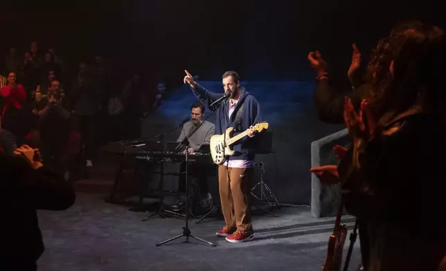 This image released by Netflix shows Adam Sandler during the taping of his comedy special "Adam Sandler: Love You" at the Nocturne Theater in Glendale, Calif. (Scott Yamano/Netflix via AP)