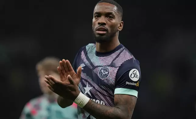 FILE - Brentford's Ivan Toney applauds fans after the English Premier League soccer match between Tottenham Hotspur and Brentford at the Tottenham Hotspur Stadium in London, Jan. 31, 2024. (AP Photo/Alastair Grant, File)