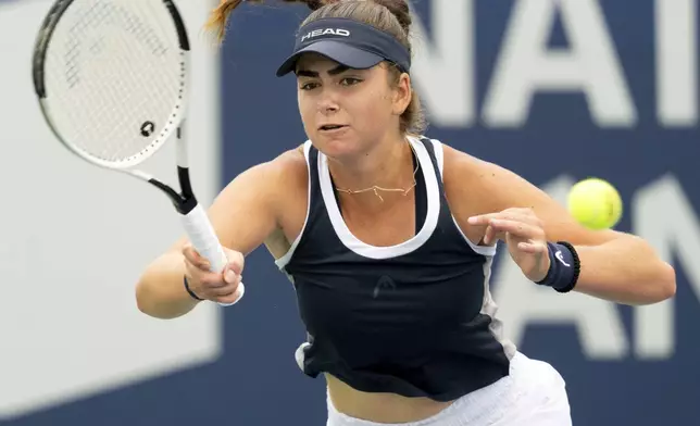 Marina Stakusic, of Canada, hits a forehand to Taylor Townsend at the National Bank Open tennis tournament in Toronto, Thursday Aug. 8, 2024. (Frank Gunn/The Canadian Press via AP)