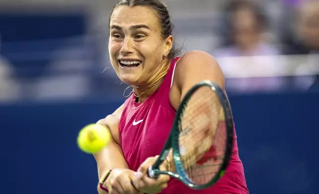 Aryna Sabalenka of Belarus hits a backhand to Yue Yuan of China at the National Bank Open in Toronto on Thursday, August 8, 2024. (Frank Gunn/The Canadian Press via AP)