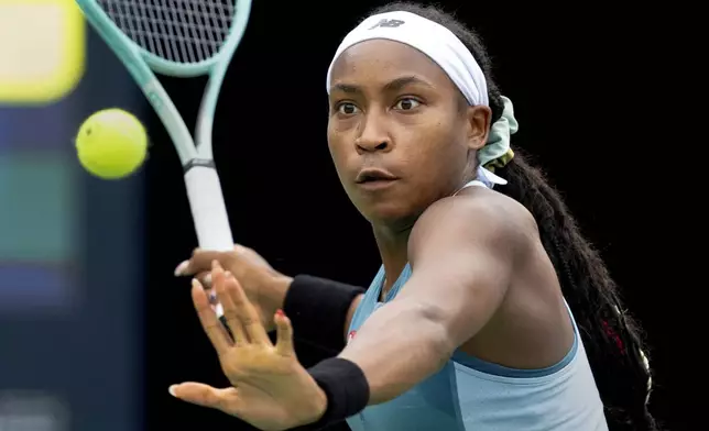 United States' Coco Gauff hits a return to China's Yafan Yang during the National Bank Open tennis tournament in Toronto , Thursday, Aug. 8, 2024. (Frank Gunn/The Canadian Press via AP)