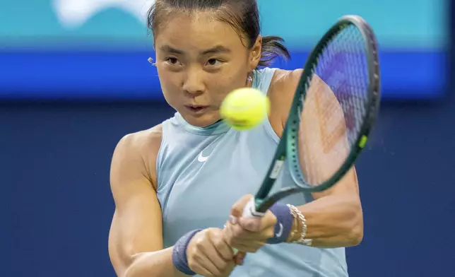 Yue Yuan, of China, hits a backhand to Aryna Sabalenka, of Belarus, at the National Bank Open tennis tournament in Toronto, Thursday, Aug. 8, 2024. (Frank Gunn/The Canadian Press via AP)