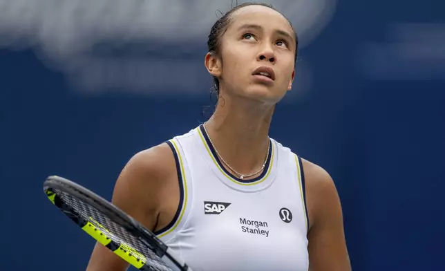 Leylah Annie Fernandez, of Canada, reacts during her match against Ashlyn Krueger at the National Bank Open tennis tournament in Toronto, Thursday Aug. 8, 2024. (Frank Gunn/The Canadian Press via AP)