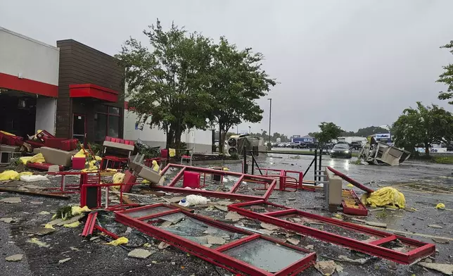 Debris covers the ground in Moncks Corner, S.C., from a possible tornado as Tropical Storm Debby settles over this region of South Carolina, Tuesday, Aug. 6, 2024 (Megan Fernandes/The Post And Courier via AP)