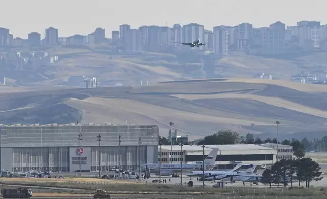 Planes believed to be carrying prisoners coming from Russia upon their arrival at the Ankara Airport, Turkey, Thursday, Aug. 1, 2024. The United States and Russia completed their biggest prisoner swap in post-Soviet history on Thursday, with Moscow releasing Wall Street Journal reporter Evan Gershkovich and Michigan corporate security executive Paul Whelan in a multinational deal that set some two dozen people free, according to officials in Turkey, where the exchange took place. (AP Photo)