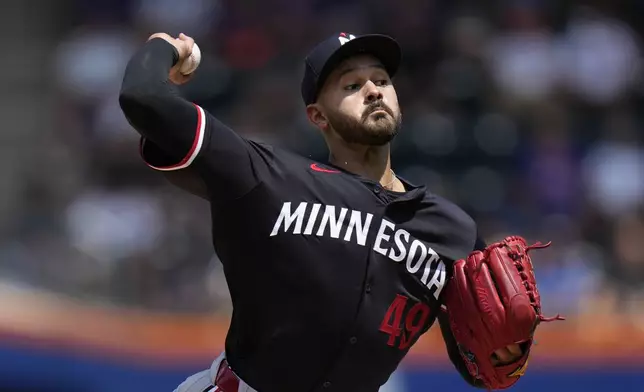 Minnesota Twins pitcher Pablo López throws during the first inning of a baseball game against the New York Mets at Citi Field, Wednesday, July 31, 2024, in New York. (AP Photo/Seth Wenig)