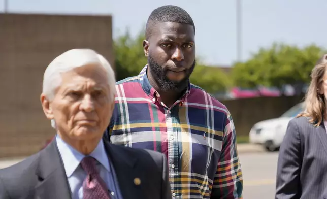 Emmitt Martin III, a former Memphis Police Department officer, second from left, accused of killing Tyre Nichols, walks into federal court Friday, Aug. 23, 2024, in Memphis, Tenn. (AP Photo/George Walker IV)