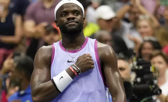 Frances Tiafoe, of the United States, reacts after defeating Ben Shelton, of the United States, during the third round of the U.S. Open tennis championships, Friday, Aug. 30, 2024, in New York. (AP Photo/Seth Wenig)