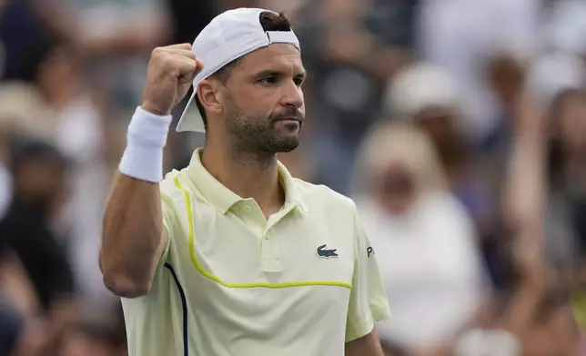 Grigor Dimitrov, of Bulgaria, reacts after defeating Tallon Griekspoor, of the Netherlands, during a third round match of the U.S. Open tennis championships, Friday, Aug. 30, 2024, in New York. (AP Photo/Julia Nikhinson)