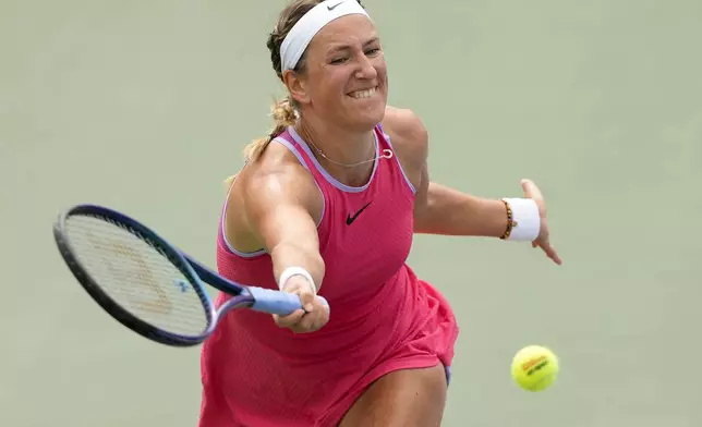 Victoria Azarenka, of Belarus, returns a shot to Wang Yafan, of China, during the third round of the U.S. Open tennis championships, Friday, Aug. 30, 2024, in New York. (AP Photo/Kirsty Wigglesworth)