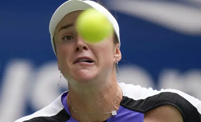 Elina Svitolina, of Ukraine, returns a shot to Coco Gauff, of the United States, during the third round of the U.S. Open tennis championships, Friday, Aug. 30, 2024, in New York. (AP Photo/Seth Wenig)