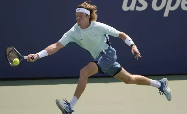 Andrey Rublev, of Russia, returns a shot to Thiago Seyboth Wild, of Brazil, during the first round of the U.S. Open tennis championships, Monday, Aug. 26, 2024, in New York. (AP Photo/Pamela Smith)