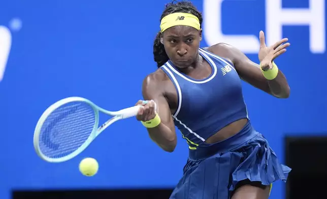 Coco Gauff, of the United States, returns a shot to Tatjana Maria, of Germany, during a second round match of the U.S. Open tennis championships, Wednesday, Aug. 28, 2024, in New York. (AP Photo/Frank Franklin II)