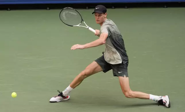 Jannik Sinner, of Italy, returns a shot to Mackenzie McDonald, of the United States, during the first round of the U.S. Open tennis championships, Tuesday, Aug. 27, 2024, in New York. (AP Photo/Julia Nikhinson)