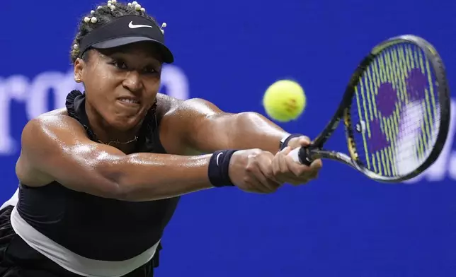 Naomi Osaka, of Japan, returns a shot to Karolina Muchova, of the Czech Republic, during the second round of the U.S. Open tennis championships, Thursday, Aug. 29, 2024, in New York. (AP Photo/Matt Rourke)