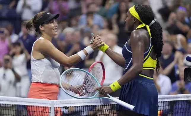 Coco Gauff, right, of the United States, shakes hands with Tatjana Maria, of Germany, during a second round match of the U.S. Open tennis championships, Wednesday, Aug. 28, 2024, in New York. (AP Photo/Frank Franklin II)