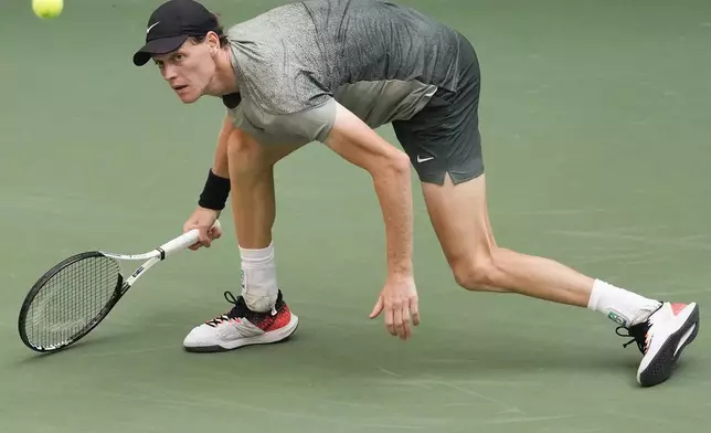 Jannik Sinner, of Italy, returns a shot to Mackenzie McDonald, of the United States, during the first round of the U.S. Open tennis championships, Tuesday, Aug. 27, 2024, in New York. (AP Photo/Julia Nikhinson)