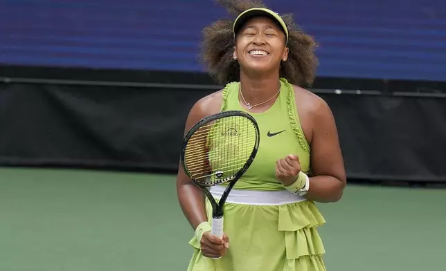 Naomi Osaka, of Japan, reacts after defeating Jelena Ostapenko, of Latvia, during the first round of the U.S. Open tennis championships, Tuesday, Aug. 27, 2024, in New York. (AP Photo/Seth Wenig)