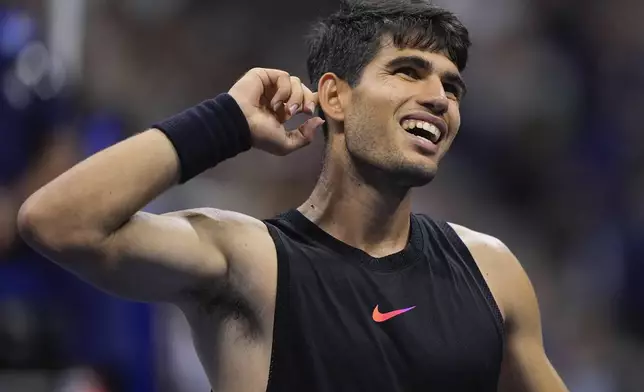 Carlos Alcaraz, of Spain, reacts during a match against Li Tu, of Australia, during the first round of the U.S. Open tennis championships, Tuesday, Aug. 27, 2024, in New York. (AP Photo/Matt Rourke)