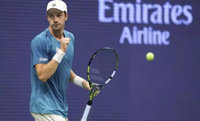 Botic van De Zandschulp, of the Netherlands, reacts after scoring a point against Carlos Alcaraz, of Spain, during the second round of the U.S. Open tennis championships, Thursday, Aug. 29, 2024, in New York. (AP Photo/Matt Rourke)