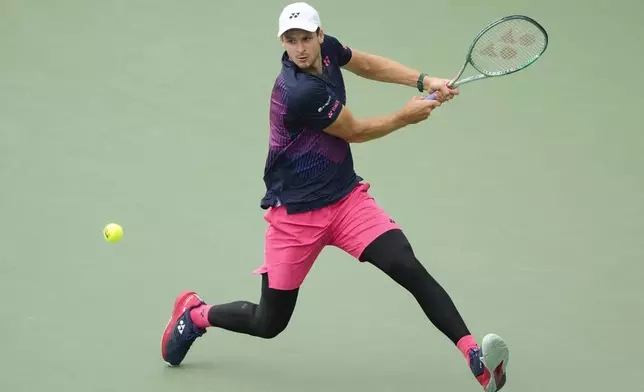 Hubert Hurkacz, of Poland, returns a shot to Jordan Thompson, of Australia, during the second round of the U.S. Open tennis championships, Thursday, Aug. 29, 2024, in New York. (AP Photo/Pamela Smith)