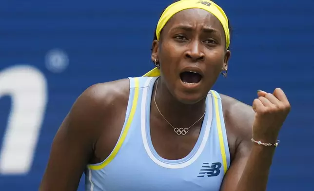 Coco Gauff, of the United States, reacts after scoring a point against Varvara Gracheva, of France, during the first round of the U.S. Open tennis championships, Monday, Aug. 26, 2024, in New York. (AP Photo/Seth Wenig)