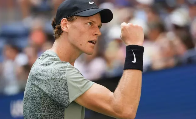 Jannik Sinner, of Italy, reacts after scoring a point against Mackenzie McDonald, of the United States, during the first round of the U.S. Open tennis championships, Tuesday, Aug. 27, 2024, in New York. (AP Photo/Kirsty Wigglesworth)