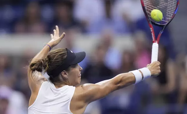 Tatjana Maria, of Germany, returns a shot to Coco Gauff, of the United States, during a second round match of the U.S. Open tennis championships, Wednesday, Aug. 28, 2024, in New York. (AP Photo/Frank Franklin II)