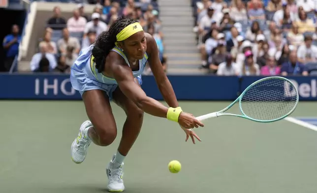 Coco Gauff, of the United States, can't catch up with a shot from Elina Svitolina, of Ukraine, during the third round of the U.S. Open tennis championships, Friday, Aug. 30, 2024, in New York. (AP Photo/Seth Wenig)