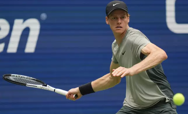 Jannik Sinner, of Italy, returns a shot to Alex Michelsen, of the United States, during the second round of the U.S. Open tennis championships, Thursday, Aug. 29, 2024, in New York. (AP Photo/Julia Nikhinson)