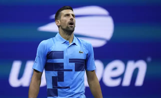 Novak Djokovic, of Serbia, reacts against Alexei Popyrin, of Australia, during a third round match of the U.S. Open tennis championships, Friday, Aug. 30, 2024, in New York. (AP Photo/Julia Nikhinson)