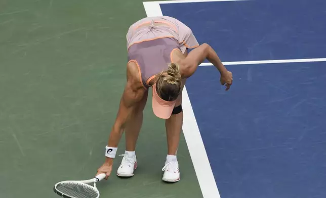 Victoria Golubic, of Switzerland, reacts during a match against Paula Badosa, of Spain, during the first round of the U.S. Open tennis championships, Monday, Aug. 26, 2024, in New York. (AP Photo/Julia Nikhinson)