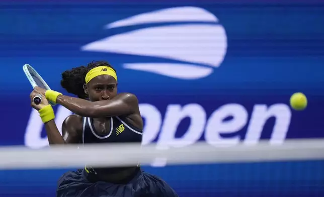 Coco Gauff, of the United States, returns a shot to Tatjana Maria, of Germany, during a second round match of the U.S. Open tennis championships, Wednesday, Aug. 28, 2024, in New York. (AP Photo/Frank Franklin II)