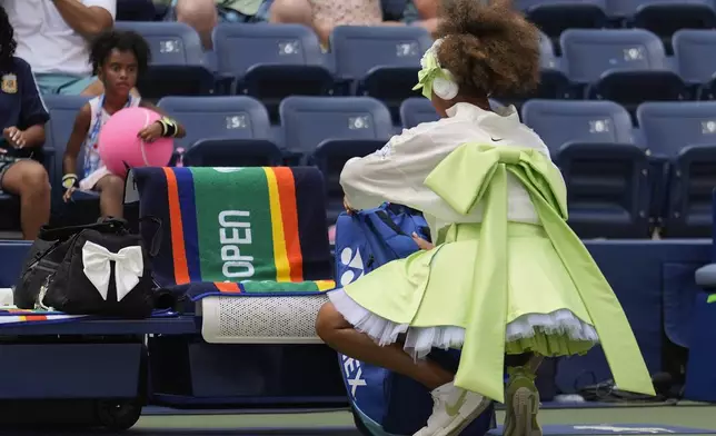 Naomi Osaka, of Japan, prepares to play against Jelena Ostapenko, of Latvia, during the first round of the U.S. Open tennis championships, Tuesday, Aug. 27, 2024, in New York. (AP Photo/Seth Wenig)