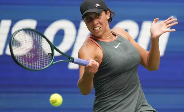 Madison Keys, of the United States, returns a shot to Katerina Siniakova, of the Czech Republic, during the first round of the U.S. Open tennis championships, Monday, Aug. 26, 2024, in New York. (AP Photo/Kirsty Wigglesworth)