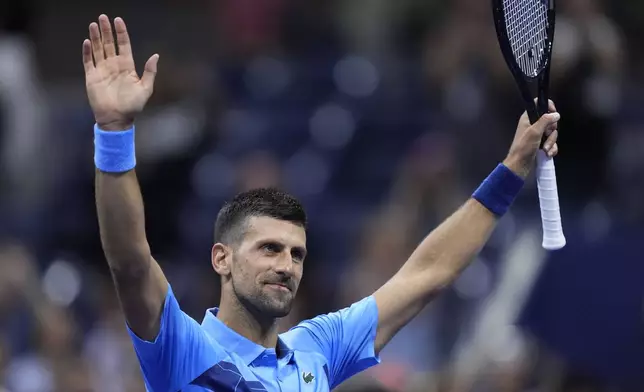 Novak Djokovic, of Serbia, reacts after defeating Radu Albot, of Moldova, during a first round match of the U.S. Open tennis championships, Monday, Aug. 26, 2024, in New York. (AP Photo/Matt Rourke)