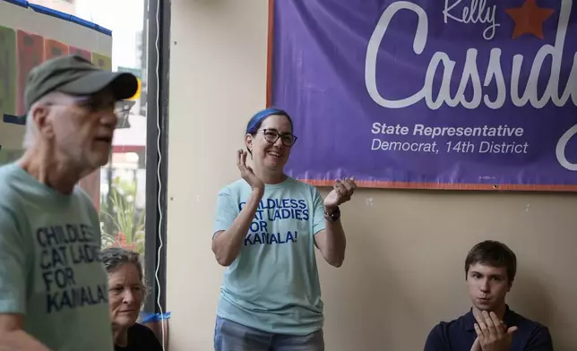 Illinois Rep. Kelly Cassidy meets with volunteers as Democrats plan canvassing efforts in Wisconsin and Michigan as part of "Operation Swing State," Sunday, July 28, 2024, in Chicago. (AP Photo/Erin Hooley)