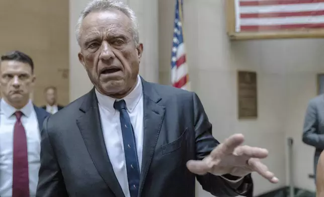 Independent Presidential candidate Robert F. Kennedy Jr. speaks to reporters at the Nassau County Supreme Court in Mineola, N.Y. on Wednesday, Aug. 21, 2024. (AP Photo/Stefan Jeremiah, Pool)