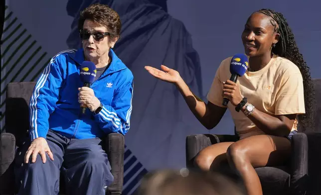 Billie Jean King, left, and Coco Gauff speak during the US Open Fan Week at the USTA Billie Jean King National Tennis Center in New York, Tuesday, Aug. 20, 2024. (AP Photo/Pamela Smith)