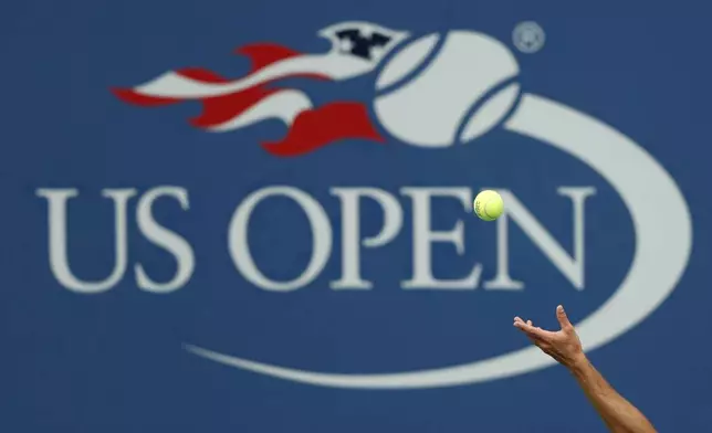 FILE - Philipp Kohlschreiber, of Germany, serves to John Millman, of Australia, during the third round of the U.S. Open tennis tournament in New York, Sept. 2, 2017. The 2024 U.S. Open begins Monday, Aug. 26.(AP Photo/Adam Hunger, File)